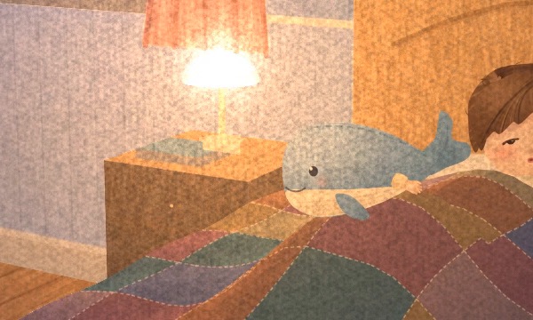 A one-to-one crop of the lamp, the nightstand and the plush whale: the light is laid on in grainy speckles of pigment, and the dark blue paper shows through wherever the light is thin.